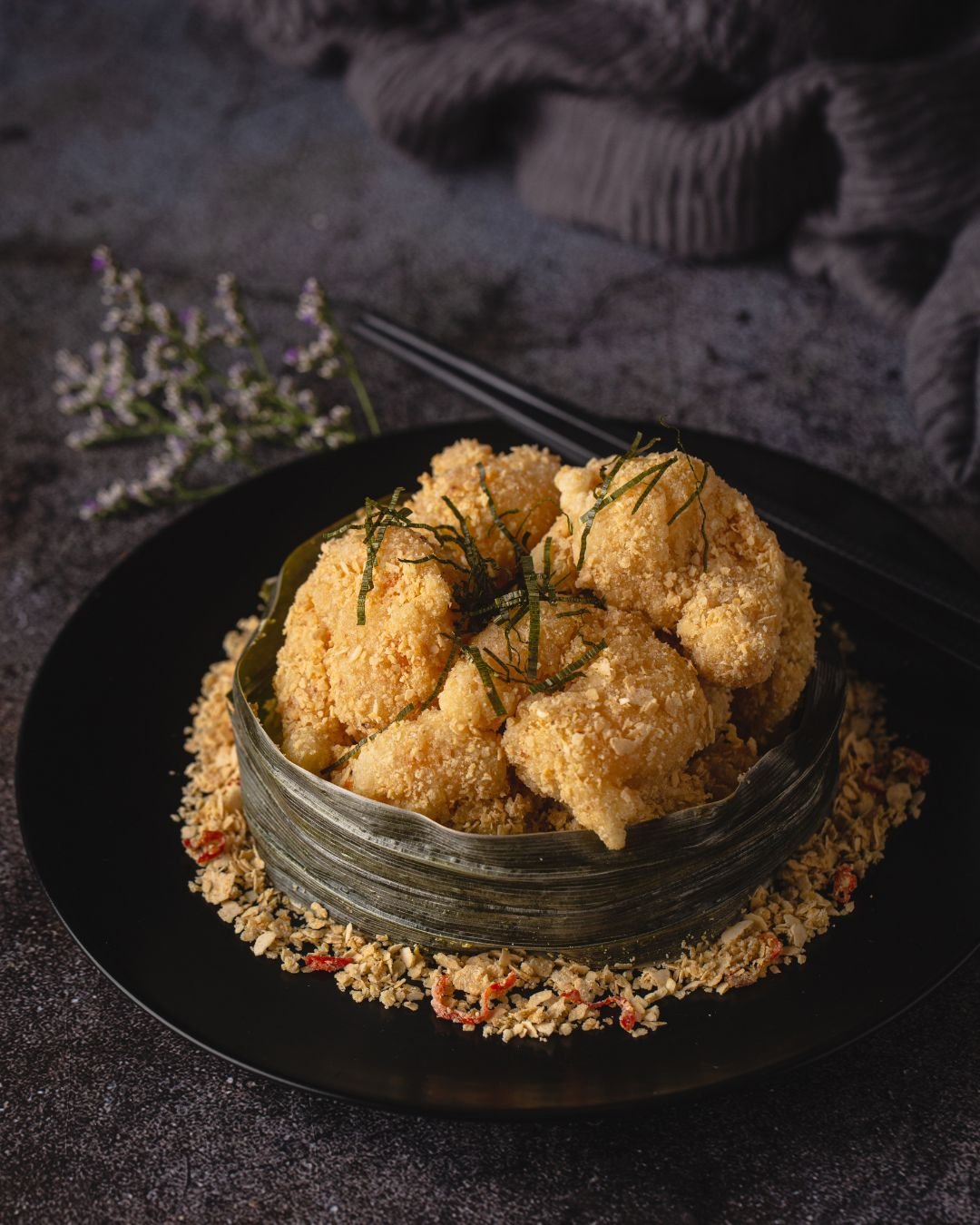 Crispy tiger prawns with pandan leaf